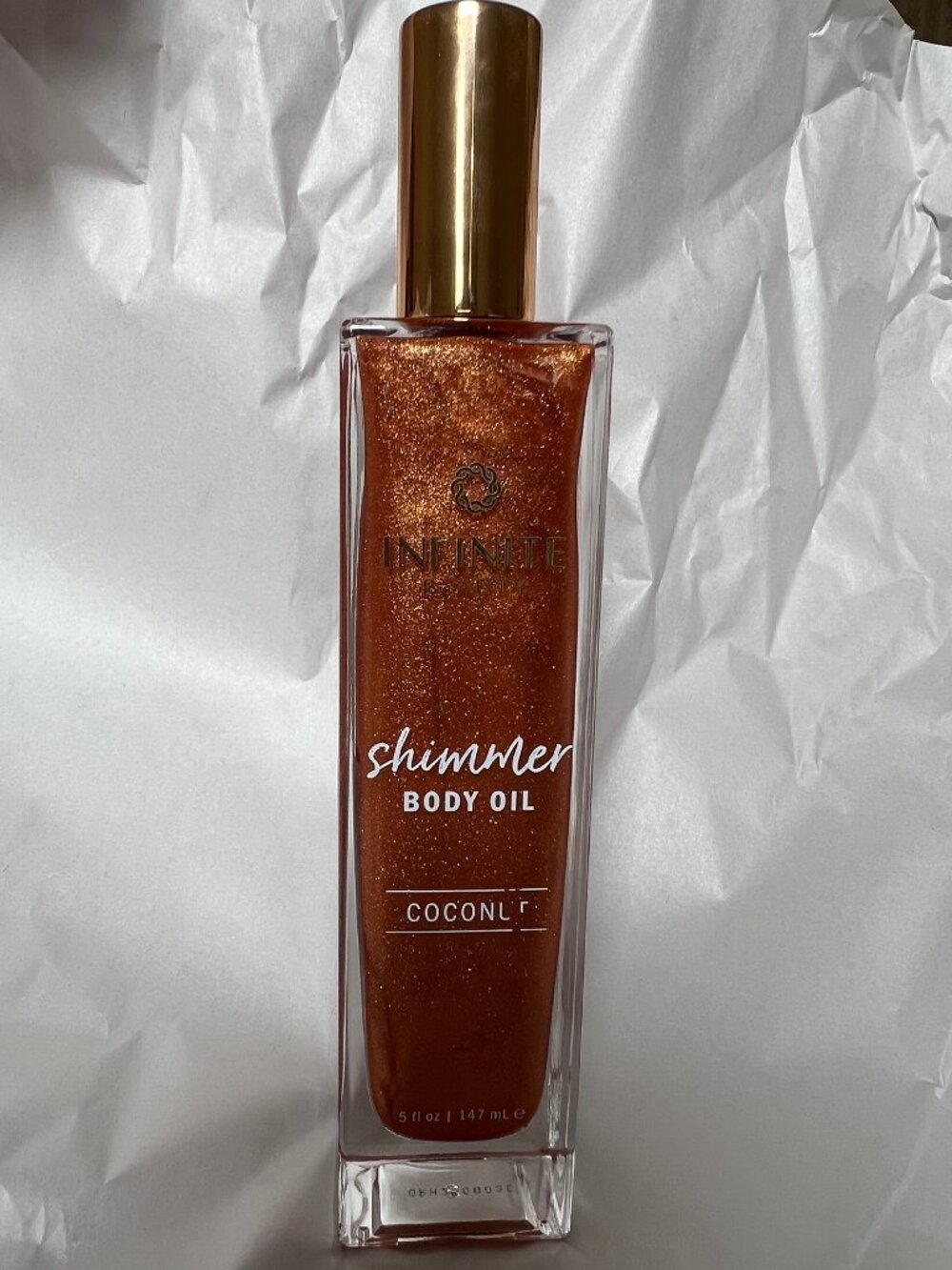 INFINITE BEAUTY Coconut Scented MOISTURIZING & GLOWING Shimmer Body Oil - 5 Oz.